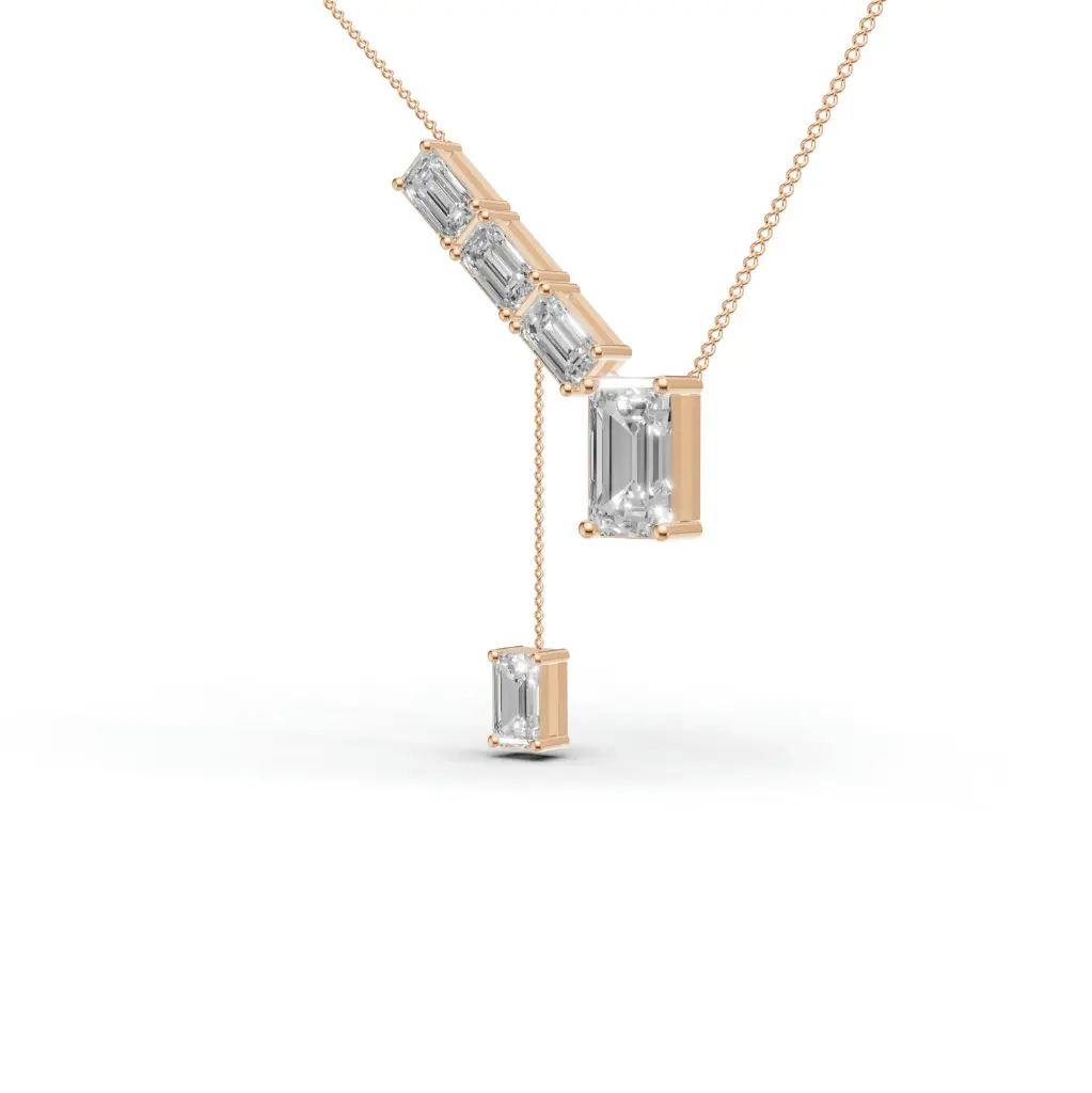 A-line emerald tansel pendant .webp